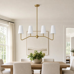 Strellux brass linear chandelier in a dining room setting
